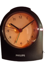 ΕΠΙΤΡΑΠΕΖΙΟ ΑΝΑΛΟΓΙΚΟ ΡΟΛΟΙ PHILIPS QUARTZ ΡΕΥΜΑΤΟΣ,ΑΘΟΡΥΒΗΣ ΛΕΙΤΟΥΡΓΙΑΣ ΜΕ ΞΥΠΝΗΤΗΡΙ ΚΑΙ ΦΩΤΙΖΟΜΕΝΟ ΚΑΝΤΡΑΝ ΣΕ ΑΠΑΛΟ ΠΟΡΤΟΚΑΛΙ ΧΡΩΜΑ